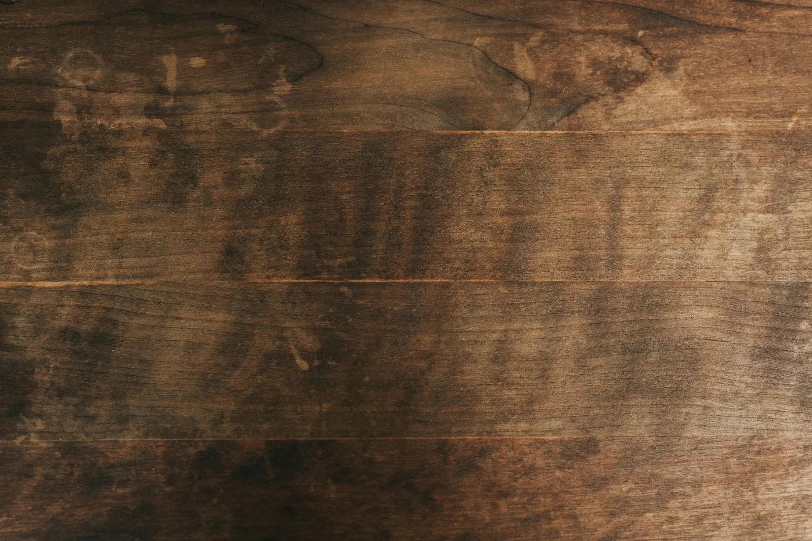 Placeholder for a before and after photo of a repaired floorboard